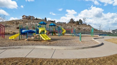 Beautifully updated and move-in ready, this ground-level condo on The Golf Club At Redlands Mesa in Colorado - for sale on GolfHomes.com, golf home, golf lot