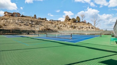 Beautifully updated and move-in ready, this ground-level condo on The Golf Club At Redlands Mesa in Colorado - for sale on GolfHomes.com, golf home, golf lot