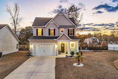Welcome to this stunning two-story, three-bedroom on Shaftesbury Glen Golf and Fish Club in South Carolina - for sale on GolfHomes.com, golf home, golf lot