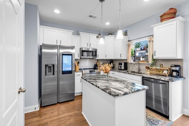 Welcome to this stunning two-story, three-bedroom on Shaftesbury Glen Golf and Fish Club in South Carolina - for sale on GolfHomes.com, golf home, golf lot