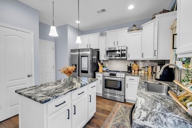 Welcome to this stunning two-story, three-bedroom on Shaftesbury Glen Golf and Fish Club in South Carolina - for sale on GolfHomes.com, golf home, golf lot