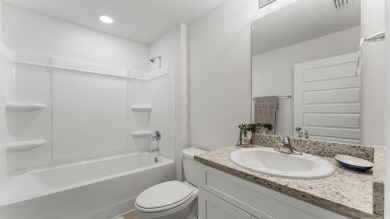Welcome to the Freeport Plan, a new home floor plan at Sunny on Sunny Hills Golf and Country Club in Florida - for sale on GolfHomes.com, golf home, golf lot