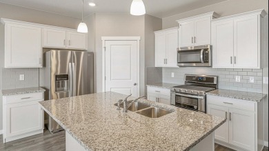 The Harmony is a Gorgeous 1-story home offering 3 bedrooms, 2 on Riverdale Golf Club in Colorado - for sale on GolfHomes.com, golf home, golf lot