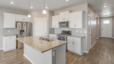 The Harmony is a Gorgeous 1-story home offering 3 bedrooms, 2 on Riverdale Golf Club in Colorado - for sale on GolfHomes.com, golf home, golf lot