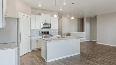 The Harmony is a Gorgeous 1-story home offering 3 bedrooms, 2 on Riverdale Golf Club in Colorado - for sale on GolfHomes.com, golf home, golf lot