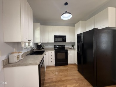 Excited to present this spacious 3 bdrm, 2.5 bath townhouse with on Hedingham Golf and Athletic Club in North Carolina - for sale on GolfHomes.com, golf home, golf lot
