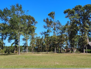 Premium recently cleared custom building lot on the 15th tee box on Players Course At Wyboo Plantation in South Carolina - for sale on GolfHomes.com, golf home, golf lot