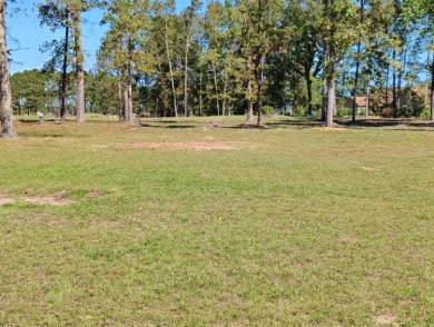 Premium recently cleared custom building lot on the 15th tee box on Players Course At Wyboo Plantation in South Carolina - for sale on GolfHomes.com, golf home, golf lot