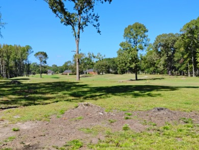 Premium recently cleared custom building lot on the 15th tee box on Players Course At Wyboo Plantation in South Carolina - for sale on GolfHomes.com, golf home, golf lot