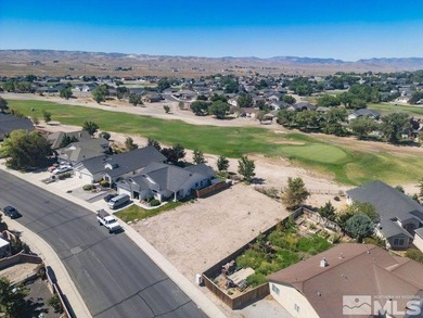 This lot backs a green on Desert Lakes Golf Course. All on The Golf Club of Fernley in Nevada - for sale on GolfHomes.com, golf home, golf lot