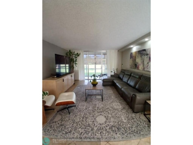REMODELED BEAUTIFUL 1ST FLOOR CONDO! This RARE 1st Floor Golf on Palm-Aire Country Club and Resort - Palms in Florida - for sale on GolfHomes.com, golf home, golf lot