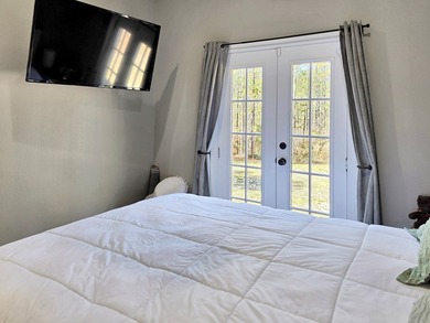 Beautiful 2-bedroom, 2-bath home built in 2024 and tucked away on Rayburn Country Club in Texas - for sale on GolfHomes.com, golf home, golf lot