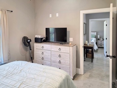 Beautiful 2-bedroom, 2-bath home built in 2024 and tucked away on Rayburn Country Club in Texas - for sale on GolfHomes.com, golf home, golf lot