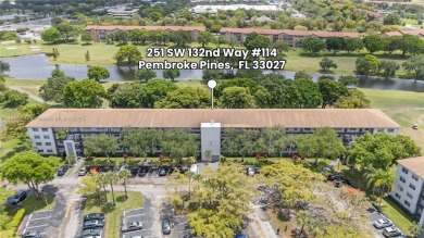 !! LOCATED ON THE FIRST FLOOR ... AND WITH GOLF COURSE VIEW on Flamingo Lakes Country Club in Florida - for sale on GolfHomes.com, golf home, golf lot