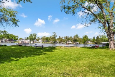 Experience the charm of this pristine home in the heart of on McHenry Country Club in Illinois - for sale on GolfHomes.com, golf home, golf lot
