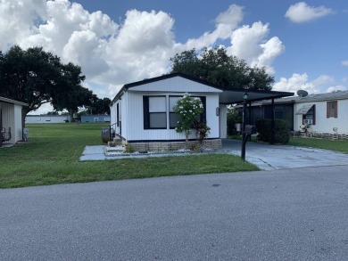 Time to buy is now! This beautiful, totally renovated 2/1.5 bath on Lake Henry Golf Club in Florida - for sale on GolfHomes.com, golf home, golf lot