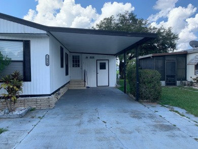 Time to buy is now! This beautiful, totally renovated 2/1.5 bath on Lake Henry Golf Club in Florida - for sale on GolfHomes.com, golf home, golf lot