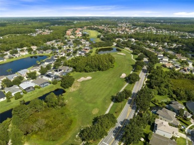 Pride of ownership is evident in this beautifully maintained on Stoneybrook East Golf Club in Florida - for sale on GolfHomes.com, golf home, golf lot