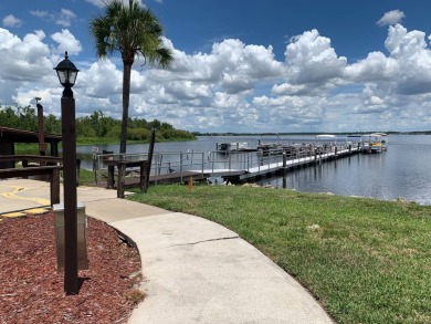 Time to buy is now! This beautiful, totally renovated 2/1.5 bath on Lake Henry Golf Club in Florida - for sale on GolfHomes.com, golf home, golf lot