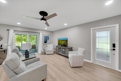 Picture this: You pull into the peaceful, gated community of on Kings Point Executive Golf Course in Florida - for sale on GolfHomes.com, golf home, golf lot