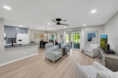 Picture this: You pull into the peaceful, gated community of on Kings Point Executive Golf Course in Florida - for sale on GolfHomes.com, golf home, golf lot