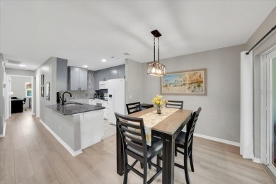 Picture this: You pull into the peaceful, gated community of on Kings Point Executive Golf Course in Florida - for sale on GolfHomes.com, golf home, golf lot