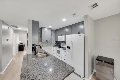Picture this: You pull into the peaceful, gated community of on Kings Point Executive Golf Course in Florida - for sale on GolfHomes.com, golf home, golf lot