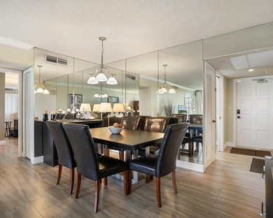 Beautifully remodeled 2BR/2BA top-floor condo in all-age Palm on  in Florida - for sale on GolfHomes.com, golf home, golf lot