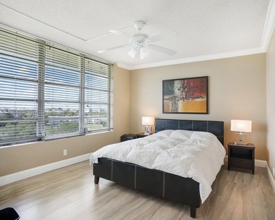 Beautifully remodeled 2BR/2BA top-floor condo in all-age Palm on  in Florida - for sale on GolfHomes.com, golf home, golf lot