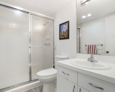 Beautifully remodeled 2BR/2BA top-floor condo in all-age Palm on  in Florida - for sale on GolfHomes.com, golf home, golf lot