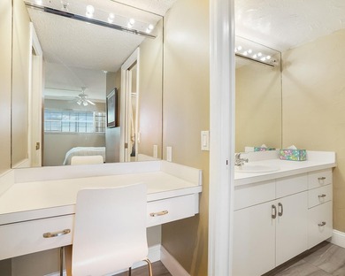 Beautifully remodeled 2BR/2BA top-floor condo in all-age Palm on  in Florida - for sale on GolfHomes.com, golf home, golf lot