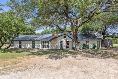 A RARE FIND! Quiet country living in this 4-bed, 3-bath CUSTOM on Lake Whitney Country Club in Texas - for sale on GolfHomes.com, golf home, golf lot