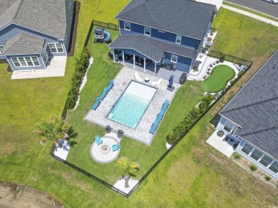 This immaculate 2 story 5 bedroom 3 full bathroom home was on International Club of Myrtle Beach in South Carolina - for sale on GolfHomes.com, golf home, golf lot