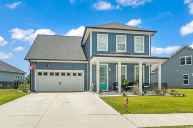 This immaculate 2 story 5 bedroom 3 full bathroom home was on International Club of Myrtle Beach in South Carolina - for sale on GolfHomes.com, golf home, golf lot