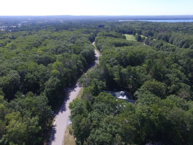 This beautiful wooded building site in one of Indian River's on Indian River Golf Club in Michigan - for sale on GolfHomes.com, golf home, golf lot
