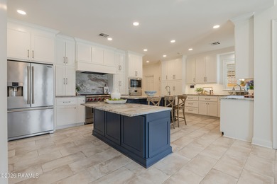 Located in the gated golf community of LeTriomphe, this on LeTriomphe Golf and Country Club in Louisiana - for sale on GolfHomes.com, golf home, golf lot