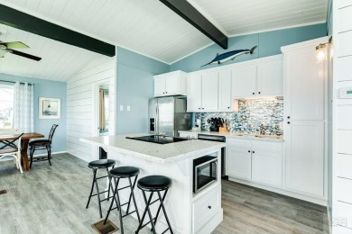 ADORABLE COASTAL COTTAGE! This affordable 2-bedroom home has on Galveston Country Club in Texas - for sale on GolfHomes.com, golf home, golf lot