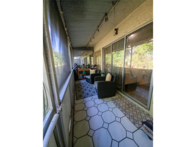 Welcome to this beautifully remodeled townhome in Tamarac! This on Colony West Country Club in Florida - for sale on GolfHomes.com, golf home, golf lot