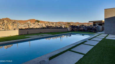Perfectly situated amongst the basalt rocks at the base of Snow on Entrada at Snow Canyon in Utah - for sale on GolfHomes.com, golf home, golf lot