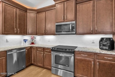 Welcome to 8879 Habersham Place.  Discover refined coastal on Brunswick Plantation and Golf Resorts in North Carolina - for sale on GolfHomes.com, golf home, golf lot