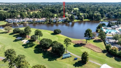 Discover this exquisite lakefront townhome at Prestonwood on Prestonwood Country Club  in North Carolina - for sale on GolfHomes.com, golf home, golf lot