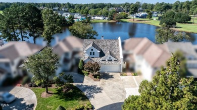 Discover this exquisite lakefront townhome at Prestonwood on Prestonwood Country Club  in North Carolina - for sale on GolfHomes.com, golf home, golf lot