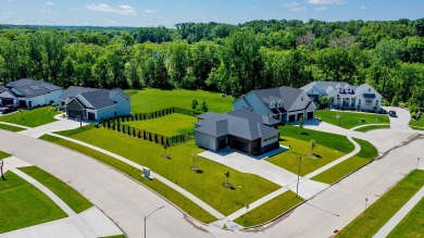 Discover this exquisite home nestled beside the Arnold Palmer on Tournament Club of Iowa in Iowa - for sale on GolfHomes.com, golf home, golf lot