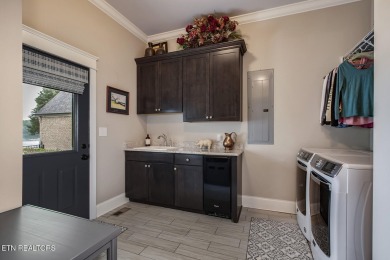 Beautiful custom french country estate that sits on 94 feet of on Wind River Golf Course in Tennessee - for sale on GolfHomes.com, golf home, golf lot