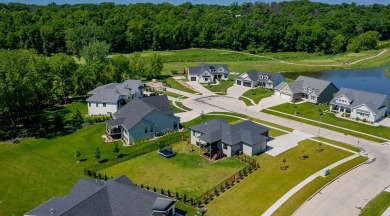 Discover this exquisite home nestled beside the Arnold Palmer on Tournament Club of Iowa in Iowa - for sale on GolfHomes.com, golf home, golf lot