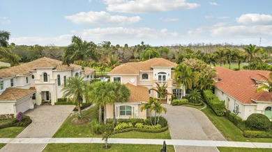 Beautiful home with a waterfront and golf course view! This home on Jupiter Country Club in Florida - for sale on GolfHomes.com, golf home, golf lot