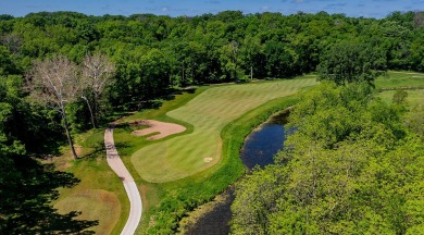 Discover this exquisite home nestled beside the Arnold Palmer on Tournament Club of Iowa in Iowa - for sale on GolfHomes.com, golf home, golf lot