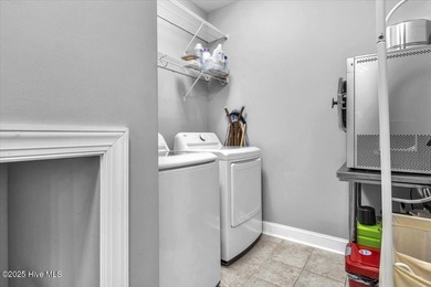 Welcome to 8879 Habersham Place. Discover refined coastal living on Brunswick Plantation and Golf Resorts in North Carolina - for sale on GolfHomes.com, golf home, golf lot