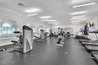 Welcome to 8879 Habersham Place.  Discover refined coastal on Brunswick Plantation and Golf Resorts in North Carolina - for sale on GolfHomes.com, golf home, golf lot