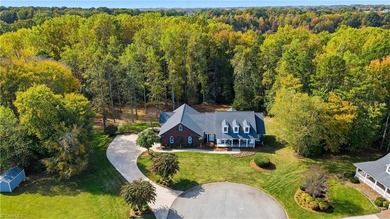 Beautiful brick home on .96 acre cul-de-sac lot. Within minutes on Warrior Golf Club in North Carolina - for sale on GolfHomes.com, golf home, golf lot